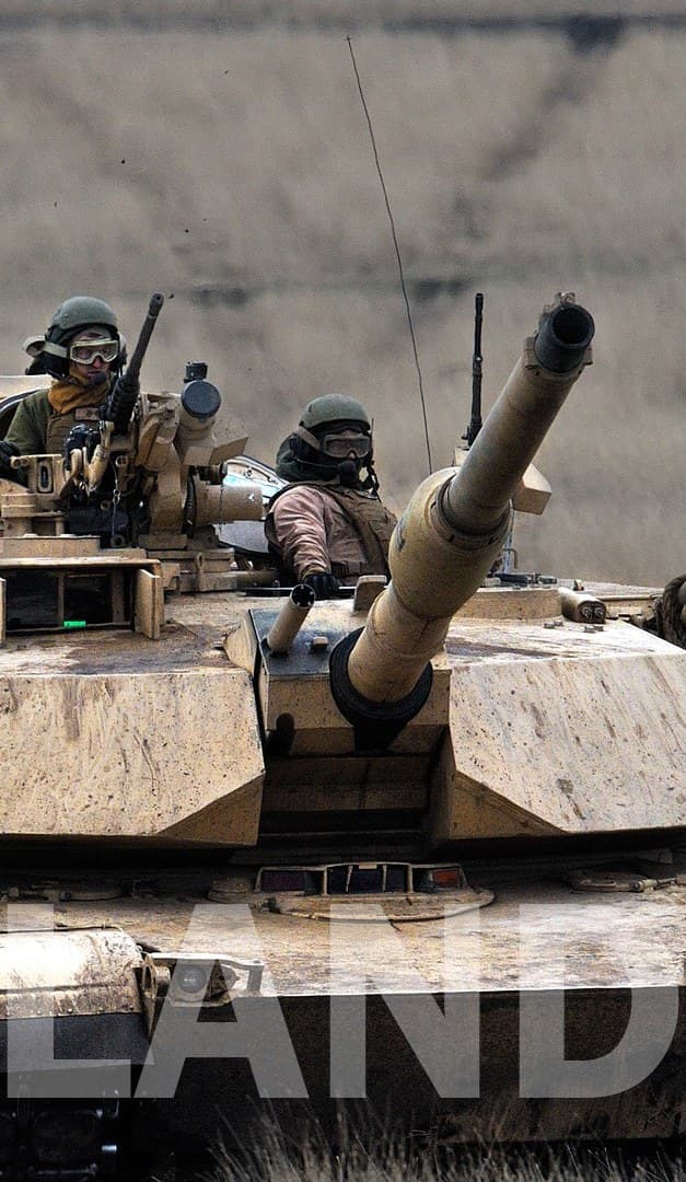 LAND — armored vehicle crew at the hatch of a main battle tank